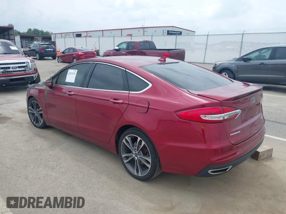 2019 Ford Fusion Titanium с VIN 3FA6P0D96KR152789, выставлен на аукционе IAAI как лот 42523192 с пробегом Не указан миль и . История ставок и продаж доступна на DreamBid. Изображение 3.