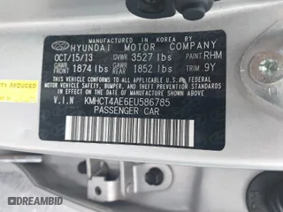 2014 Hyundai Accent GLS with VIN KMHCT4AE6EU586785, listed as a IAAI auction lot 41674060 with 135,355 mi miles. Bid and sale history available at carsss.com. Image 9.