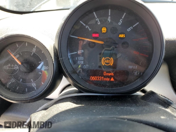 2015 MINI Convertible with VIN WMWZN3C56FT266838, listed as a Copart auction lot 50250745 with 60,331 mi miles and Salvage title. Bid and sale history available at DreamBid. Image 9.