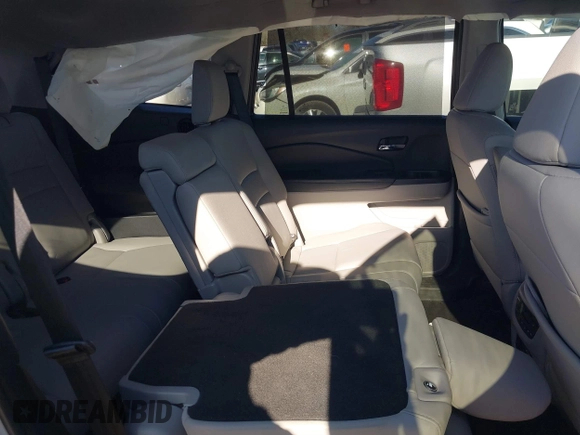 2020 Honda Pilot Touring 8-Passenger with VIN 5FNYF6H95LB021455, listed as a IAAI auction lot 41187609 with 35,589 mi miles and . Bid and sale history available at DreamBid. Image 8.