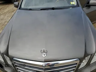 2011 Mercedes-Benz E-Class E 550 Luxury with VIN WDDHF9AB1BA385318, listed as a Copart auction lot 66115634 with 197,595 mi miles and Salvage Title. Bid and sale history available at carsss.com. Image 12.