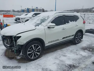 2017 Nissan Rogue SL with VIN 5N1AT2MV9HC792104, listed as a IAAI auction lot 40991192 with 82,393 mi miles. Bid and sale history available at carsss.com. Image 2.