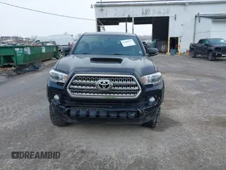 2016 Toyota Tacoma SR with VIN 3TMCZ5AN2GM027945, listed as a IAAI auction lot 41446277 with 51,781 mi miles and . Bid and sale history available at DreamBid. Image 13.