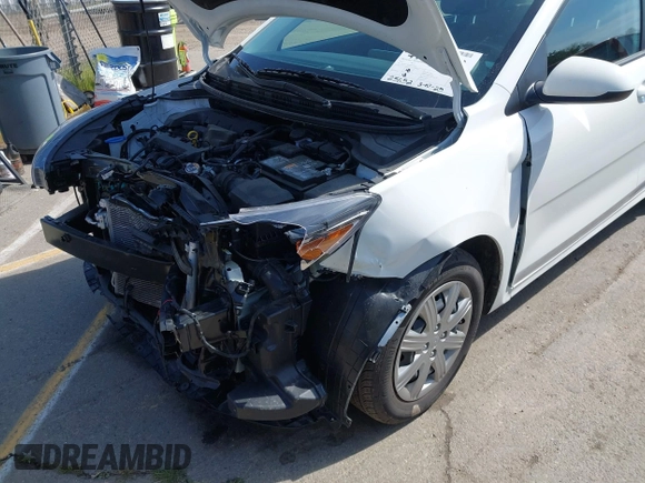 2023 Kia Rio S with VIN 3KPA25AD0PE629868, listed as a IAAI auction lot 41738952 with 25,642 mi miles and . Bid and sale history available at DreamBid. Image 6.