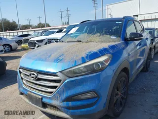 2017 Hyundai Tucson Value with VIN KM8J33A2XHU467861, listed as a IAAI auction lot 41684522 with 96,841 mi miles. Bid and sale history available at carsss.com. Image 6.