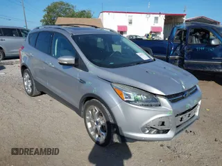 2016 Ford Escape Titanium with VIN 1FMCU0J94GUB11776, listed as a IAAI auction lot 41945655 with 119,949 mi miles. Bid and sale history available at carsss.com. Image 1.