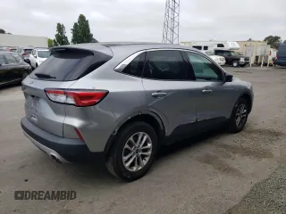 2022 Ford Escape SE with VIN 1FMCU0G63NUA69580, listed as a Copart auction lot 60127375 with 61,556 mi miles and Salvage title. Bid and sale history available at DreamBid. Image 3.