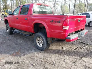 2004 Dodge Dakota Sport with VIN 1D7HG38N64S677103, listed as a IAAI auction lot 41665245 with 212,470 mi miles and . Bid and sale history available at carsss.com. Image 3.