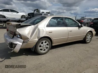 1998 Toyota Camry LE z VIN JT2BF28K4W0114447, wystawiony jako Copart lot #50846275 z przebiegiem 288 989 mil mil oraz Szkoda całkowita • Salvage title. Historia ofert i sprzedaży dostępna na DreamBid. Obrazek 3.