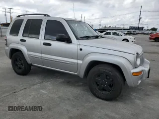 2003 Jeep Liberty Limited with VIN 1J4GK58K33W649265, listed as a Copart auction lot 54264095 with 154,152 mi miles and Salvage title. Bid and sale history available at DreamBid. Image 4.