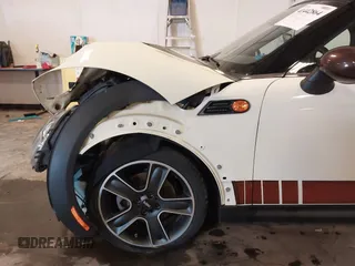 2013 MINI Roadster with VIN WMWSY1C52DT625564, listed as a IAAI auction lot 41442864 with 98,240 mi miles and . Bid and sale history available at DreamBid. Image 18.