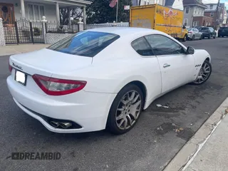 2009 Maserati GranTurismo with VIN ZAMGJ45A690043450, listed as a Copart auction lot 42032305 with 51,080 mi miles and Clean Title. Bid and sale history available at carsss.com. Image 4.