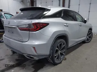 2017 Lexus RX with VIN 2T2BZMCAXHC067275, listed as a IAAI auction lot 41386504 with 100,477 mi miles. Bid and sale history available at carsss.com. Image 4.