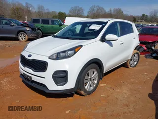 2019 Kia Sportage LX with VIN KNDPM3AC3K7536691, listed as a IAAI auction lot 41733413 with 77,095 mi miles. Bid and sale history available at carsss.com. Image 2.