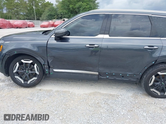 2023 Kia Telluride S with VIN 5XYP64GC0PG386895, listed as a IAAI auction lot 42365625 with 41,588 mi miles and . Bid and sale history available at DreamBid. Image 6.