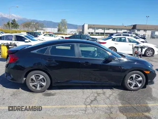 2020 Honda Civic LX z VIN 19XFC2F6XLE212683, wystawiony jako IAAI lot #41745743 z przebiegiem 81 553 mil mil oraz . Historia ofert i sprzedaży dostępna na DreamBid. Obrazek 14.