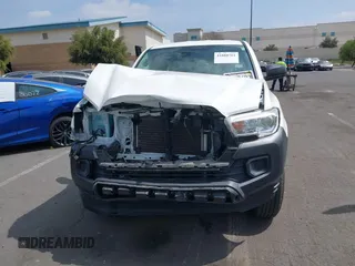 2020 Toyota Tacoma SR with VIN 3TYRX5GN0LT001284, listed as a IAAI auction lot 41888761 with 52,466 mi miles and . Bid and sale history available at DreamBid. Image 13.