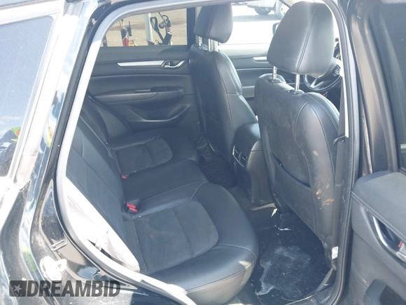 2018 Mazda CX-5 Touring z VIN JM3KFACM5J0309533, wystawiony jako IAAI lot #42195429 z przebiegiem 91 928 mil mil oraz . Historia ofert i sprzedaży dostępna na DreamBid. Obrazek 8.
