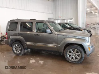 2012 Jeep Liberty Sport with VIN 1C4PJMAK9CW176792, listed as a IAAI auction lot 41685594 with 213,748 mi miles. Bid and sale history available at carsss.com. Image 12.