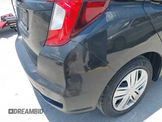 2020 Honda Fit LX z VIN 3HGGK5H45LM733449, wystawiony jako IAAI lot #42388666 z przebiegiem 28 064 mil mil oraz . Historia ofert i sprzedaży dostępna na DreamBid. Obrazek 18.