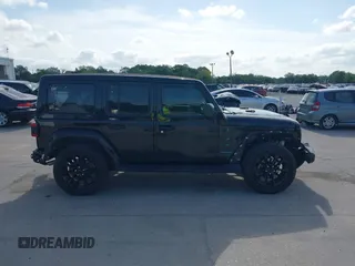 2022 Jeep Wrangler Unlimited Sahara with VIN 1C4JJXP60NW153776, listed as a IAAI auction lot 42108916 with 39,123 mi miles and . Bid and sale history available at DreamBid. Image 14.