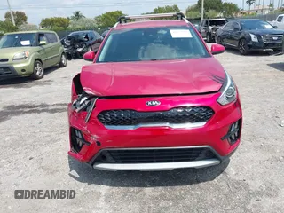 2020 Kia Niro LX with VIN KNDCB3LCXL5436098, listed as a IAAI auction lot 42037995 with 22,080 mi miles and . Bid and sale history available at DreamBid. Image 6.