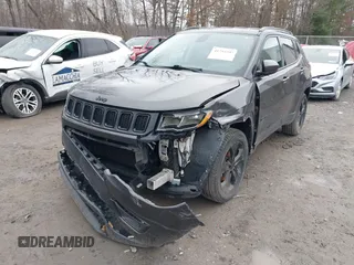 2020 Jeep Compass Latitude with VIN 3C4NJDBB5LT209864, listed as a IAAI auction lot 41793397 with 95,018 mi miles and . Bid and sale history available at DreamBid. Image 6.