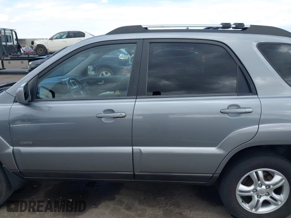 2005 Kia Sportage LX with VIN KNDJE723257122055, listed as a IAAI auction lot 42192102 with 167,726 mi miles and . Bid and sale history available at carsss.com. Image 14.