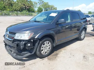 2017 Dodge Journey SE with VIN 3C4PDCAB2HT579852, listed as a IAAI auction lot 42008261 with 112,234 mi miles and . Bid and sale history available at DreamBid. Image 2.