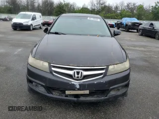 2006 Acura TSX Navi z VIN JH4CL959X6C024778, wystawiony jako Copart lot #60128995 z przebiegiem 148 377 mil mil oraz Czysty tytuł • Clean title. Historia ofert i sprzedaży dostępna na DreamBid. Obrazek 5.