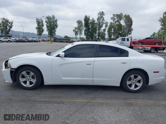 2014 Dodge Charger SE with VIN 2C3CDXBG3EH131242, listed as a IAAI auction lot 42121260 with 231,452 mi miles and . Bid and sale history available at DreamBid. Image 14.