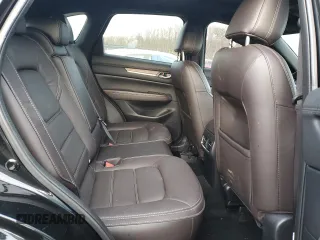 2024 Mazda CX-5 2.5 Turbo Signature with VIN JM3KFBXY7R0515256, listed as a Copart auction lot 87404694 with 4,699 mi miles and Salvage Title. Bid and sale history available at carsss.com. Image 11.