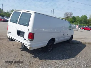 2014 Ford Econoline Cargo Commercial with VIN 1FTNS2EW2EDA83939, listed as a IAAI auction lot 42159453 with 148,947 mi miles. Bid and sale history available at carsss.com. Image 4.