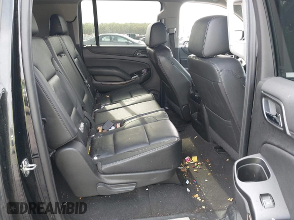 2019 Chevrolet Suburban LT with VIN 1GNSCHKC2KR408575, listed as a IAAI auction lot 42060103 with 144,838 mi miles and . Bid and sale history available at DreamBid. Image 8.