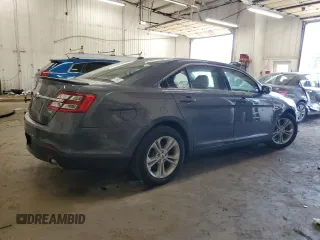 2015 Ford Taurus SEL with VIN 1FAHP2E84FG102318, listed as a Copart auction lot 61744685 with 82,149 mi miles and Salvage title. Bid and sale history available at DreamBid. Image 3.
