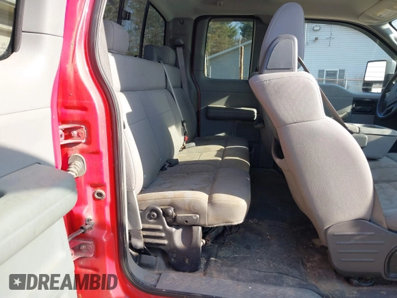 2005 Ford F-150 STX with VIN 1FTRX14W35NA68052, listed as a IAAI auction lot 41768704 with 146,336 mi miles. Bid and sale history available at carsss.com. Image 8.