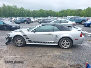 2002 Ford Mustang Deluxe z VIN 1FAFP44492F221578, wystawiony jako IAAI lot #42242232 z przebiegiem 107 773 mil mil oraz . Historia ofert i sprzedaży dostępna na DreamBid. Obrazek 15.