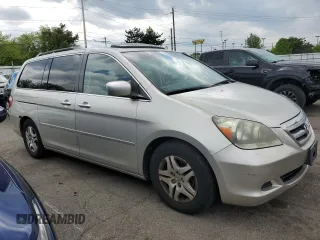 2005 Honda Odyssey EX-L with VIN 5FNRL38785B108229, listed as a Copart auction lot 55579145 with 165,870 mi miles and Clean Title. Bid and sale history available at carsss.com. Image 4.