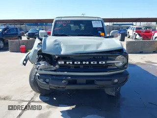 2021 Ford Bronco with VIN 1FMDE5BHXMLB06040, listed as a IAAI auction lot 41490539 with 57,915 mi miles. Bid and sale history available at carsss.com. Image 12.