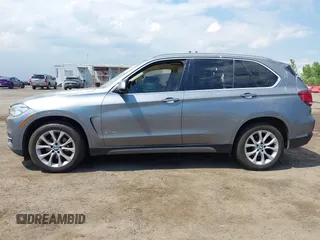 2014 BMW X5 xDrive35i z VIN 5UXKR0C5XE0K43570, wystawiony jako IAAI lot #42211578 z przebiegiem 260 817 mil mil oraz . Historia ofert i sprzedaży dostępna na DreamBid. Obrazek 14.