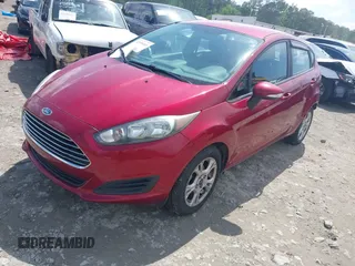 2016 Ford Fiesta SE z VIN 3FADP4EJ4GM178707, wystawiony jako IAAI lot #42095480 z przebiegiem 96 454 mil mil oraz . Historia ofert i sprzedaży dostępna na DreamBid. Obrazek 2.