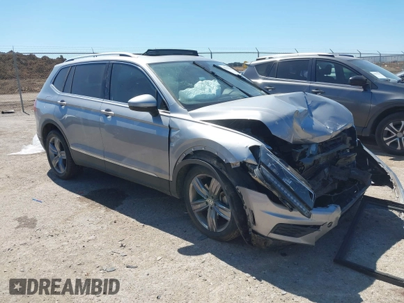 2019 Volkswagen Tiguan SEL Premium with VIN 3VV4B7AX5KM085435, listed as a IAAI auction lot 41839386 with 124,501 mi miles and . Bid and sale history available at DreamBid. Image 1.