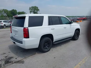 2018 Chevrolet Tahoe Commercial z VIN 1GNSKDEC8JR238969, wystawiony jako IAAI lot #42440047 z przebiegiem 126 373 mil mil oraz . Historia ofert i sprzedaży dostępna na DreamBid. Obrazek 4.