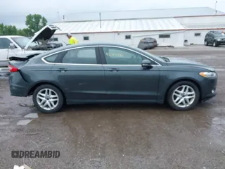 2015 Ford Fusion SE z VIN 1FA6P0HD9F5101925, wystawiony jako IAAI lot #42314400 z przebiegiem 159 548 mil mil oraz . Historia ofert i sprzedaży dostępna na DreamBid. Obrazek 13.