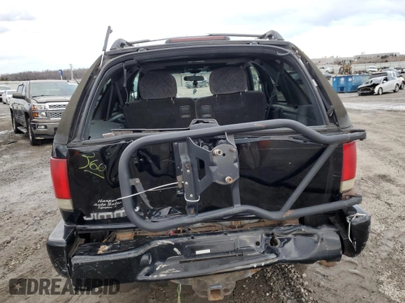 2000 Chevrolet Blazer LS z VIN 1GNCT18W1YK151830, wystawiony jako Copart lot #88799235 z przebiegiem 190 019 mil mil oraz Nie do naprawy • Non repairable. Historia ofert i sprzedaży dostępna na DreamBid. Obrazek 6.