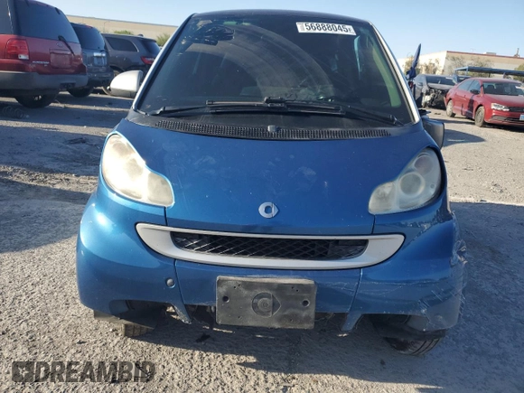 2009 Smart fortwo Pure z VIN WMEEJ31X39K273968, wystawiony jako Copart lot #56888045 z przebiegiem 125 138 mil mil oraz Szkoda całkowita • Salvage title. Historia ofert i sprzedaży dostępna na DreamBid. Obrazek 5.