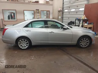 2014 Cadillac CTS Luxury AWD with VIN 1G6AX5S3XE0158960, listed as a IAAI auction lot 41258609 with 84,360 mi miles and . Bid and sale history available at DreamBid. Image 13.