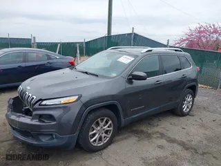 2015 Jeep Cherokee Latitude with VIN 1C4PJMCB9FW764791, listed as a IAAI auction lot 42005658 with 105,026 mi miles. Bid and sale history available at carsss.com. Image 18.