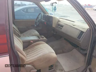 1993 GMC Suburban with VIN 1GKEC16KXPJ734150, listed as a IAAI auction lot 42114021 with 254,501 mi miles and . Bid and sale history available at DreamBid. Image 5.