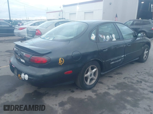 1998 Ford Taurus with VIN 1FAFP52S1WG133518, listed as a IAAI auction lot 41861996 with 122,868 mi miles and . Bid and sale history available at DreamBid. Image 4.